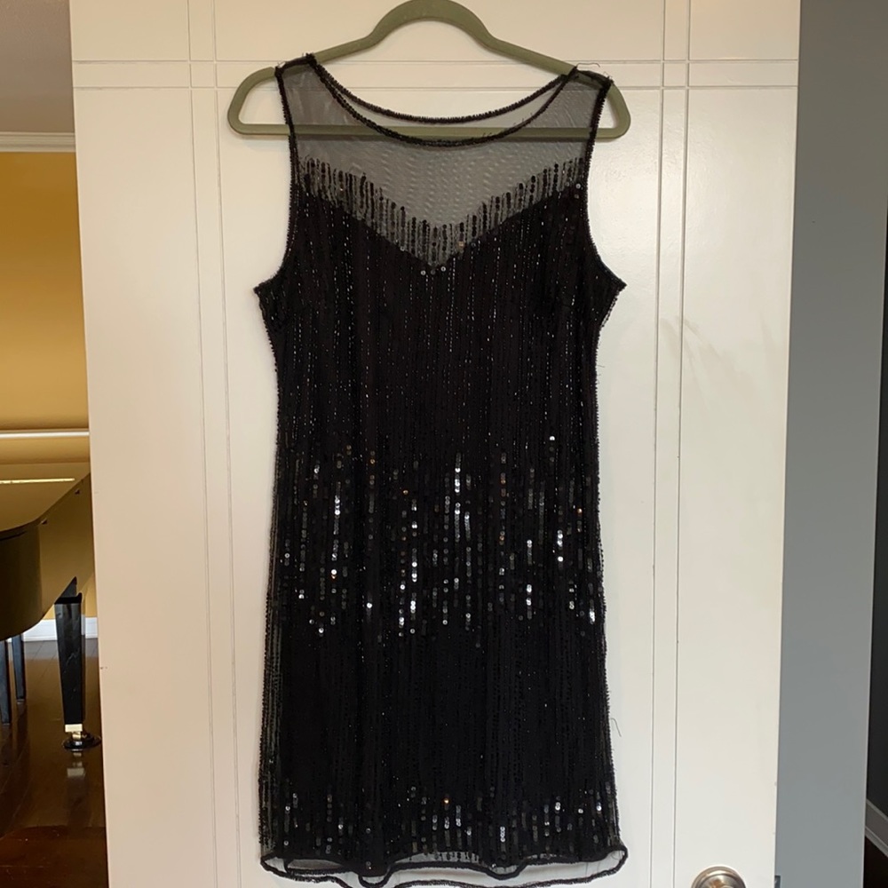 Black sequence cocktail dress.